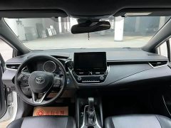 Toyota Corolla Hybrid 1.8H E-CVT Luxury - ფოტო 3