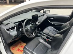Toyota Corolla Hybrid 1.8H E-CVT Luxury - ფოტო 4