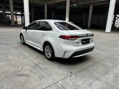 Toyota Corolla Hybrid 1.8H E-CVT Luxury - ფოტო 6