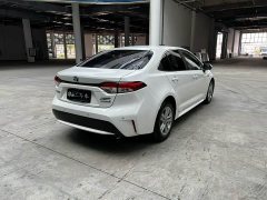 Toyota Corolla Hybrid 1.8H E-CVT Luxury - ფოტო 8