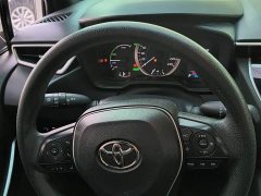 Toyota Corolla Hybrid 1.8H E-CVT Luxury - ფოტო 18
