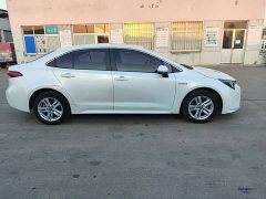 Toyota Corolla 2022 Hybrid 1.8H E-CVT Luxury - ფოტო 4