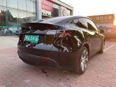 Tesla Model Y Standard Range RWD - ფოტო 4
