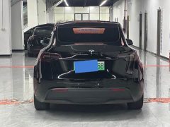 Tesla Model Y Rear-Wheel Drive - ფოტო 4