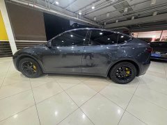Tesla Model Y Rear-Wheel Drive - ფოტო 3
