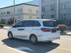 Honda Odyssey 2.0L e:HEV Luxury - ფოტო 4