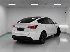 Tesla Model Y Rear-Wheel Drive - ფოტო 17