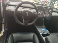 Tesla Model Y Rear-Wheel Drive - ფოტო 4