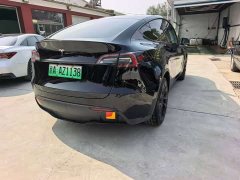 Tesla Model Y Standard Range RWD - ფოტო 4