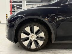 Tesla Model Y Standard Range RWD - ფოტო 13