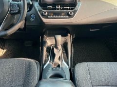 Toyota Corolla Hybrid 1.8H E-CVT Luxury - ფოტო 10