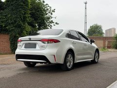 Toyota Corolla Hybrid 1.8H E-CVT Luxury - ფოტო 6