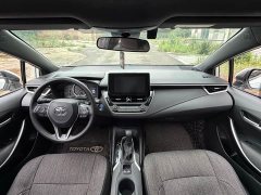Toyota Corolla Hybrid 1.8H E-CVT Luxury - ფოტო 9