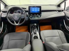 Toyota Corolla Hybrid 1.8H E-CVT Luxury - ფოტო 15