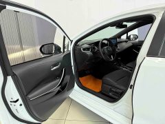 Toyota Corolla Hybrid 1.8H E-CVT Luxury - ფოტო 7