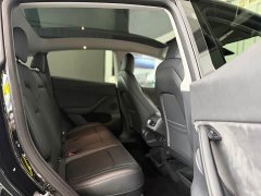 Tesla Model Y Standard Range RWD - ფოტო 11