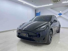 Tesla Model Y Rear-Wheel Drive - ფოტო 1