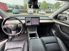 Tesla Model Y Standard Range RWD - ფოტო 11