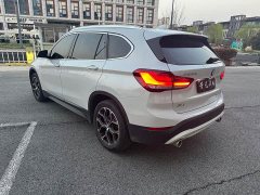 BMW X1 sDrive25Li Premier - ფოტო 10