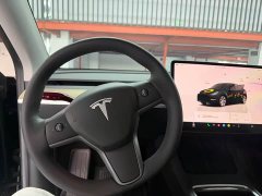 Tesla Model Y Rear-Wheel Drive - ფოტო 11