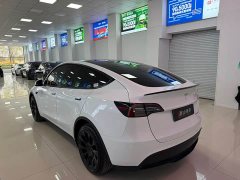 Tesla Model Y Rear-Wheel Drive - ფოტო 4