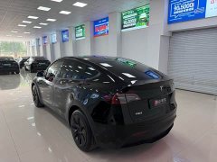 Tesla Model Y Rear-Wheel Drive - ფოტო 4