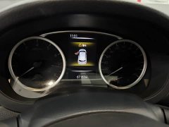 Nissan Qida Tiida 1.6L CVT Smart Edition - ფოტო 7