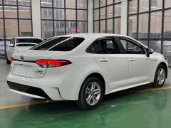 Toyota Corolla Hybrid 1.8H E-CVT Luxury - ფოტო 12