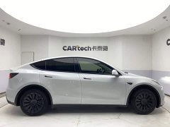 Tesla Model Y Standard Range RWD - ფოტო 4