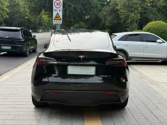 Tesla Model Y Standard Range RWD - ფოტო 7