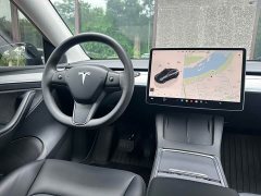 Tesla Model Y Rear-Wheel Drive - ფოტო 12