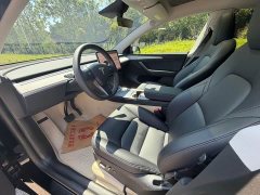 Tesla Model Y Rear-Wheel Drive - ფოტო 4