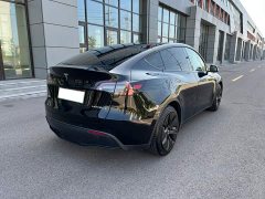 Tesla Model Y Standard Range RWD - ფოტო 4