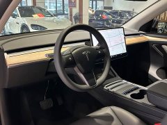 Tesla Model Y Standard Range RWD - ფოტო 9