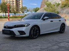 Honda Civic 2.0L e:HEV Sport Edition - ფოტო 1