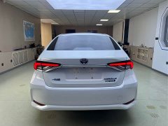 Toyota Corolla 2021 Hybrid 1.8L E-CVT Elite - ფოტო 5