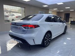 Toyota Corolla Hybrid 1.8H E-CVT Sport - ფოტო 6