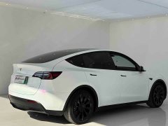 Tesla Model Y Standard Range RWD - ფოტო 13