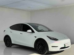 Tesla Model Y Standard Range RWD - ფოტო 2