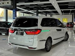 Honda Odyssey 2.0L e:HEV Luxury - ფოტო 17