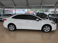 Toyota Corolla Hybrid 1.8H E-CVT Luxury - ფოტო 7