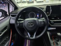 Toyota Corolla Hybrid 1.8H E-CVT Sport - ფოტო 13