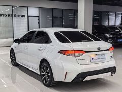Toyota Corolla Hybrid 1.8H E-CVT Sport - ფოტო 5