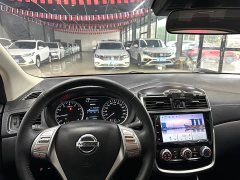 Nissan Qida Tiida 1.6L CVT Smart Edition - ფოტო 14