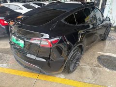 Tesla Model Y Standard Range RWD - ფოტო 9
