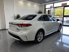 Toyota Corolla Hybrid 1.8H E-CVT Luxury - ფოტო 4