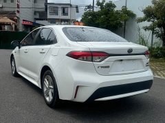 Toyota Corolla Hybrid 1.8H E-CVT Base - ფოტო 5