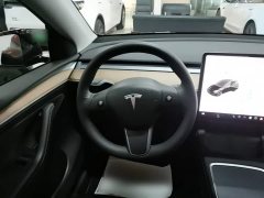 Tesla Model Y Standard Range RWD - ფოტო 11