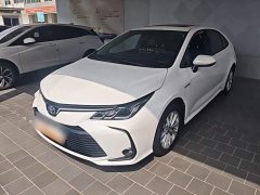 Toyota Corolla 2021 Hybrid 1.8L E-CVT Elite - ფოტო 2