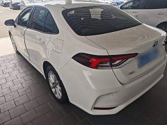 Toyota Corolla 2021 Hybrid 1.8L E-CVT Elite - ფოტო 5